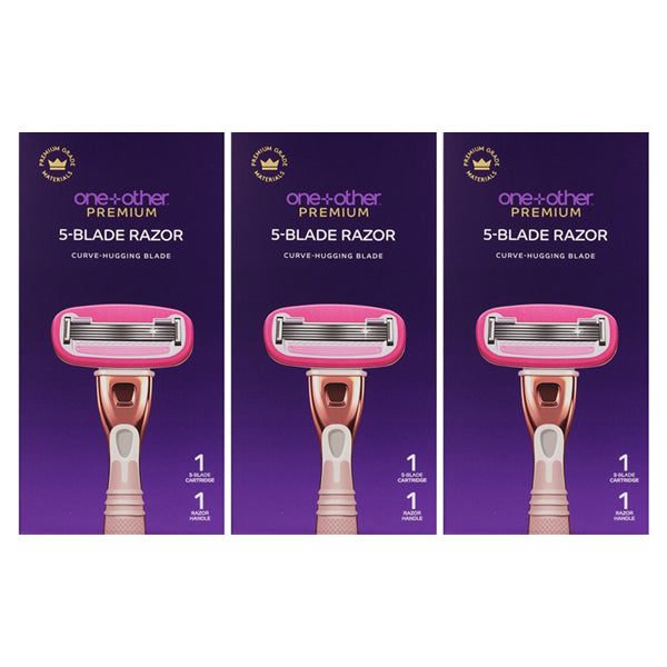 Three boxes of one+other Blissfully Smooth 5-Blade Razor, each with curve-hugging blades and a lubricating surround, featuring a pink and rose gold razor on a purple background.